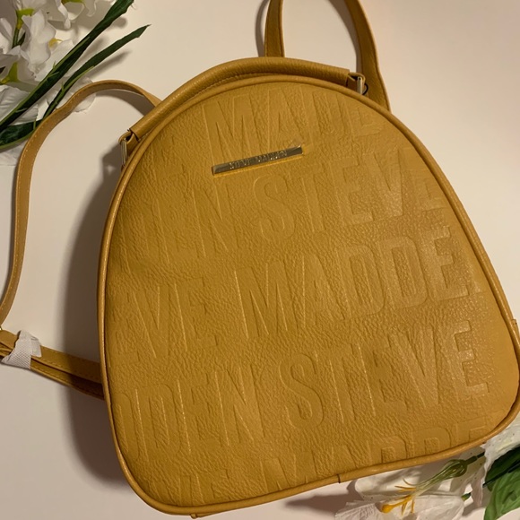 Steve Madden Handbags - GORGEOUS NWT Steve Madden Mustard Logo Backpack